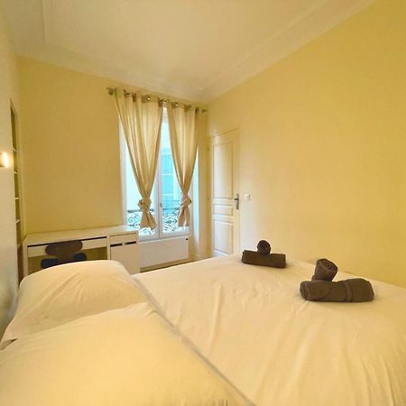 Chambre Lit Double Et Salon Avec Canape-Lit A 10 Minutes Des Champs Elysees Parigi Esterno foto